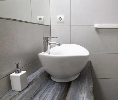 a white sink in a bathroom with a mirror at Monastiraki 309 SuperHost Hub in Athens