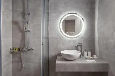 a bathroom with a sink and a shower at Athenian Spirit in Athens