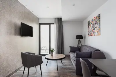 a living room with a couch and a table at Athenian Spirit in Athens