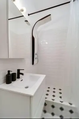 a white bathroom with a sink and a mirror at Monastiraki 506 SuperHost Hub in Athens