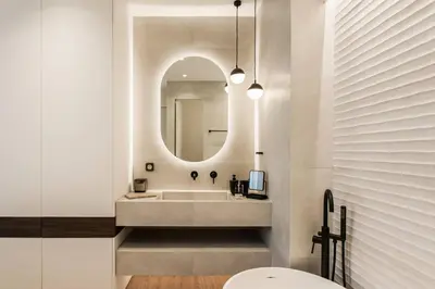 a bathroom with a sink and a mirror at 5BD Luxury Penthouse with Sea View in Athens