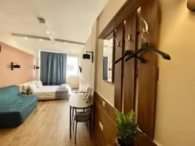a living room with a room with a bed and a table at Monastiraki 306 SuperHost Hub in Athens