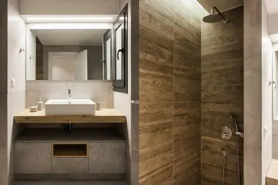 a bathroom with a sink and a mirror at Chic Apartment - Strolling to the Athenian streets in Athens