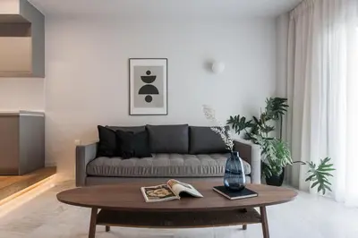 a living room with a couch and a coffee table at Marvelous 2BR Apartments with balcony by UPSTREET in Athens