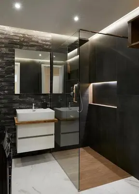a bathroom with a sink and a glass shower at Central & Comfy apartment 2mins walking from metro in Athens