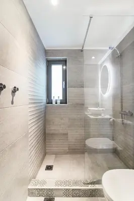 a bathroom with a shower and a toilet and a sink at Dreamy Athens Loft with City View in Athens