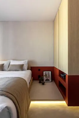 a bedroom with a bed and a book shelf at The Newel Psychiko in Athens