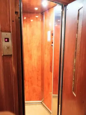 a shower in a room with a glass door at Elegant apartment under the Acropolis in Athens