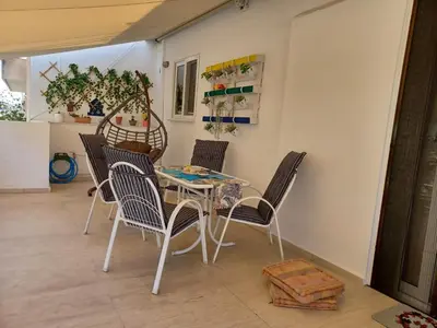 a dining room with a table and chairs at ZEN Neapoli Penthouse Apartment in Athens