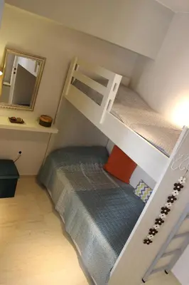 a bedroom with a bunk bed and a bunk bedouble at ZEN Neapoli Penthouse Apartment in Athens