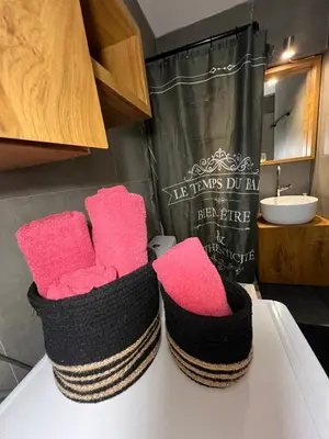 two baskets sitting on a table in a bathroom at New apartment at Athenian Riviera in Athens