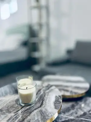 a candle sitting on top of a table at New apartment at Athenian Riviera in Athens