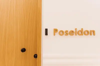 a door with a sign that reads i passion at Agora Athens Suites in Athens