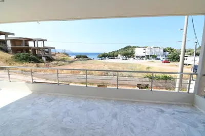 a balcony with a view of the ocean at Villa Niso in Anavissos