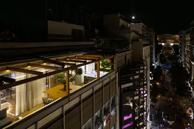 an overhead view of a city street at night at Ethereal Athεns in Athens