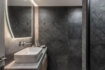 a bathroom with a sink and a shower at Ethereal Athεns in Athens
