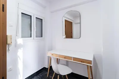 a bathroom with a desk and a mirror at Luxury penthouse , breathtaking Acropolis view in Athens