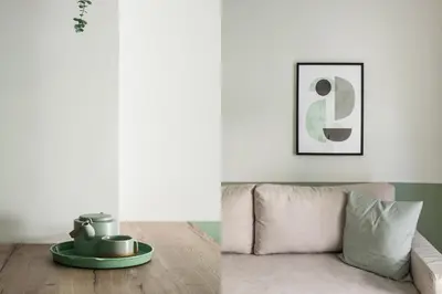 a living room with a couch and a picture at Dazzling 1BR Apartment in Koukaki by UPSTREET in Athens