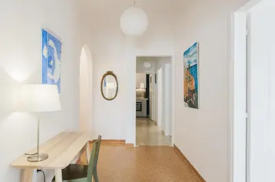 a dining room with a table and a mirror at Elegant 2 Bedroom 2 Bathroom Apartment in Athens Vibrant Centre! VL5 in Athens