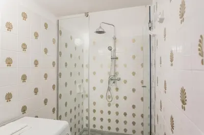 a bathroom with a shower and a toilet at Elegant 2 Bedroom 2 Bathroom Apartment in Athens Vibrant Centre! VL5 in Athens