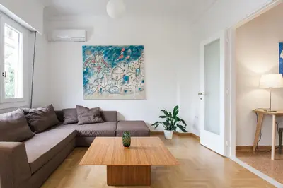 a living room with a couch and a table at Elegant 2 Bedroom 2 Bathroom Apartment in Athens Vibrant Centre! VL5 in Athens