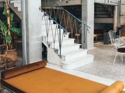 a view of a stairway with a bench in a building at Mona Athens in Athens