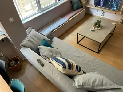 a living room with a couch and a table at Athens Historical Centre 2 Bedroom Apt. in Athens