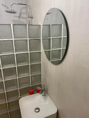a bathroom with a sink and a mirror at Athens Historical Centre 2 Bedroom Apt. in Athens