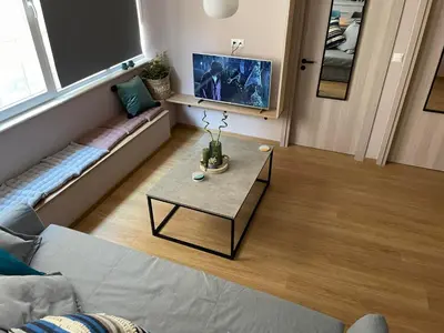 a living room with a couch and a table at Athens Historical Centre 2 Bedroom Apt. in Athens