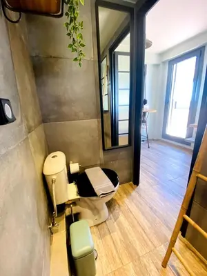 a bathroom with a toilet and a mirror at 200Mbps Wifi - Penthouse With Acropolis View in Athens