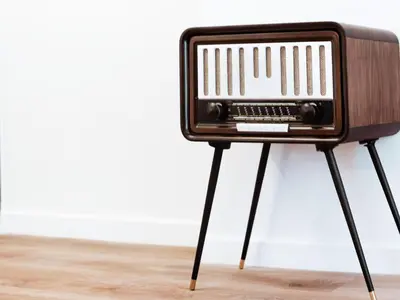 a radio on stand on a wooden floor at Luxury Apartment in the Heart of the City - 1BR in Athens