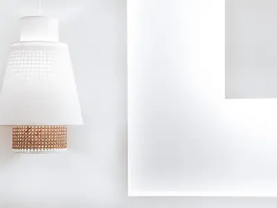 a lamp hanging on a wall next to a window at Luxury Apartment in the Heart of the City - 1BR in Athens