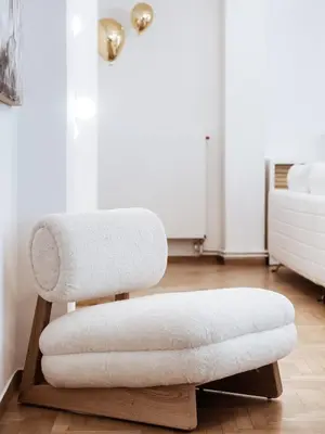 a stool with two towels on it in a room at Luxury 3BR Apartment in the Heart of the City in Athens