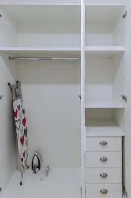 a closet with white cabinets and a drawer at Niovis Loft VIPGreece in Athens