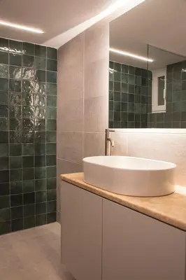 a bathroom with a sink and a mirror at Acropolis View-Living Stone Amethyst in Athens