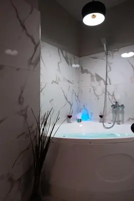 a bathroom with a shower and a toilet and a sink at Nueva Era Boutique in Athens