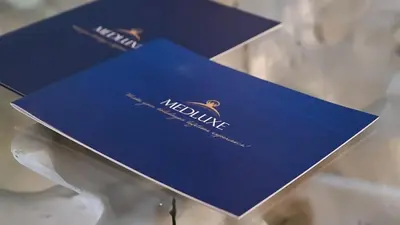 a blue box on top of a glass table at MEDLUXE EASY ACROPOLIS APARTMENT! in Athens