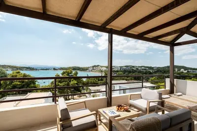 a balcony with a view of the water at Athens Riviera Bay View Suite By The Olon in Athens