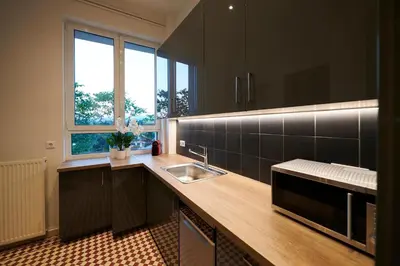 a kitchen with a sink and a counter top at Ma Maison No7 Acropolis View Mansion, Roof Garden in Athens