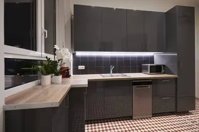 a kitchen with a counter with a sink and a microwave at Ma Maison No7 Acropolis View Mansion, Roof Garden in Athens