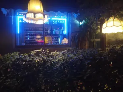 a bar at night with blue lights at Skyhi Athens Penthouse ! in Athens