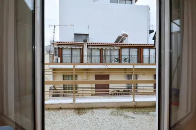 a view of a building from a window at Studio in the heart of Athens, next to Metro &... in Athens