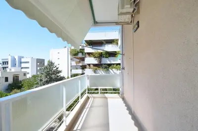 a balcony with a view of a building at A spacious minimal apatment at Chalandri in Athens