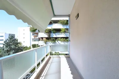 a balcony with a view of a building at A spacious minimal apatment at Chalandri in Athens