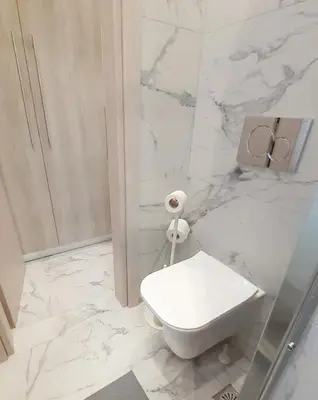 a white bathroom with a toilet and a shower at Athens Anasa's Studio in Athens