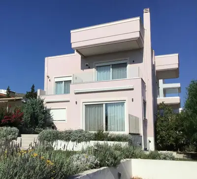a white building with plants in front of it at ATHENS RIVIERA Grand Panoramic Villa Lagonissi in Lagonissi