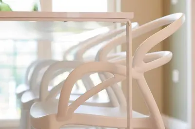 a row of white chairs sitting next to a table at Ma Maison No6 Acropolis View Mansion,3bdrs,400Mbps in Athens