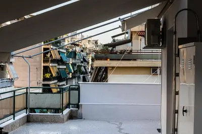 a view from the balcony of a building at Ami's Appartment in Athens in Athens