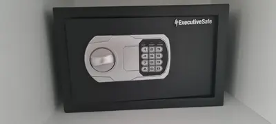 a safe with a remote control inside of it at Kalliopis Apartment in Athens