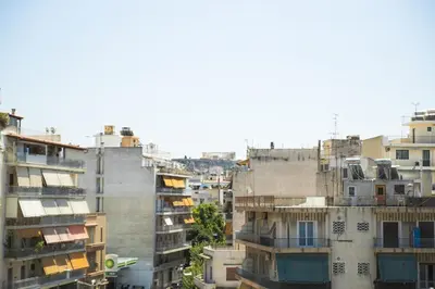 an overhead view of a city with buildings at P & I in Athens